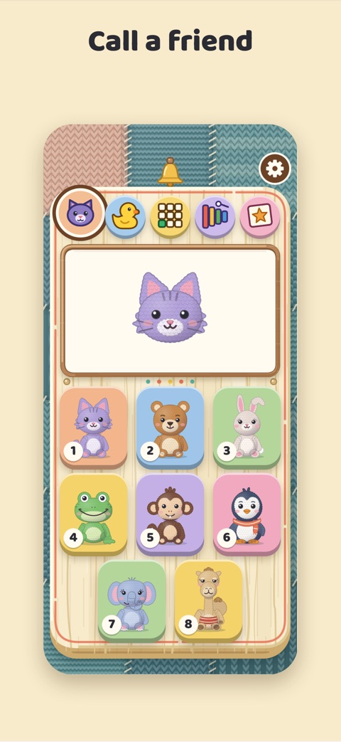 Call a friend: the wooden phone with eight soft-toy friends on its keys